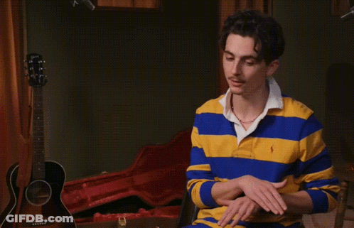 A Man In A Blue And Yellow Striped Shirt With The Words 100 % Mission Accomplished On The Bottom GIF