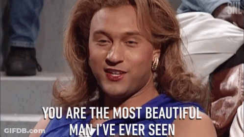 A Man In A Blue Dress With The Words You Are The Most Beautiful Man I 'Ve Ever Seen GIF