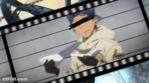 A Man In A Blue Hat Is Holding A Piece Of Paper In His Hand GIF