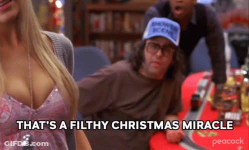 A Man In A Blue Hat Says That 'S A Filthy Christmas Miracle . GIF