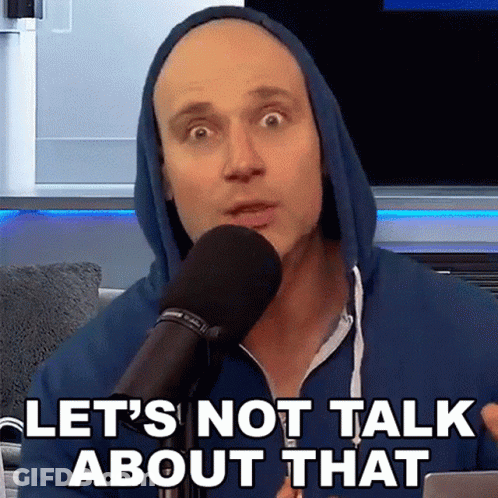 A Man In A Blue Hoodie Is Speaking Into A Microphone And Says Let 'S Not Talk About That GIF