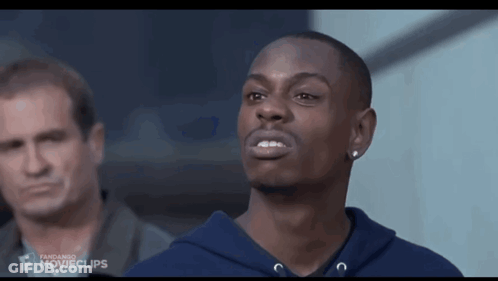 A Man In A Blue Hoodie Is Standing In Front Of A Man In A Grey Shirt With Movieclips Written On The Bottom GIF