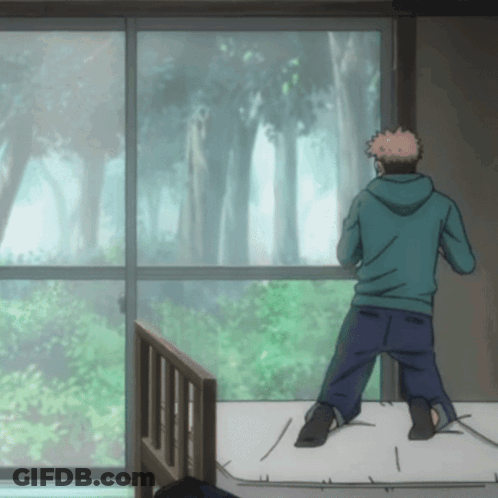 A Man In A Blue Hoodie Is Standing On A Bed In Front Of A Window GIF