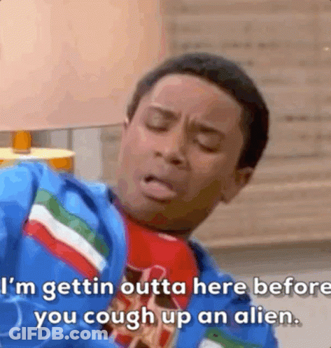A Man In A Blue Jacket And Tie Is Talking About Getting Outta Here Before You Cough Up An Alien . GIF