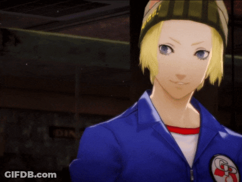 A Man In A Blue Jacket Holding A Cell Phone With The Letter R On It GIF
