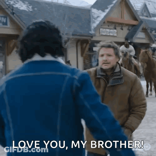 A Man In A Blue Jacket Is Holding The Hand Of Another Man In A Brown Jacket And Saying Love You My Brother . GIF