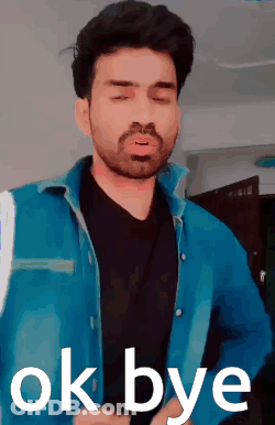 A Man In A Blue Jacket Says Ok Bye In White Letters GIF