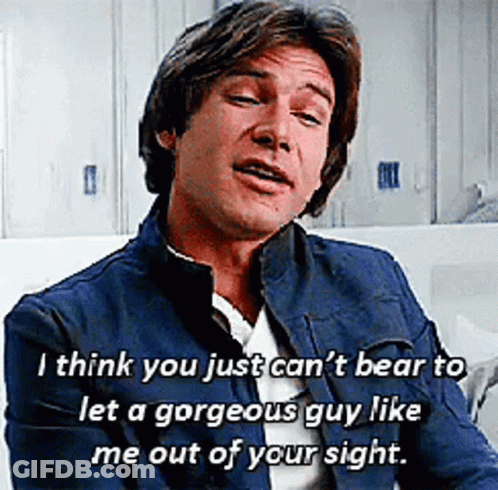 A Man In A Blue Jacket With A Quote On His Face GIF