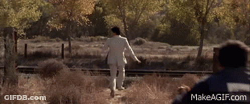 A Man In A Blue Jacket With Makeagif.com On The Bottom Left GIF