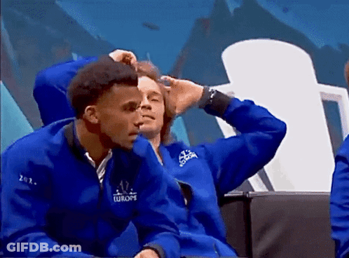 A Man In A Blue Jacket With The Word Europa On The Front GIF