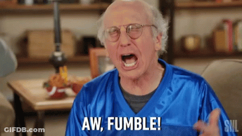A Man In A Blue Jersey Is Screaming And Saying Aw Fumble . GIF