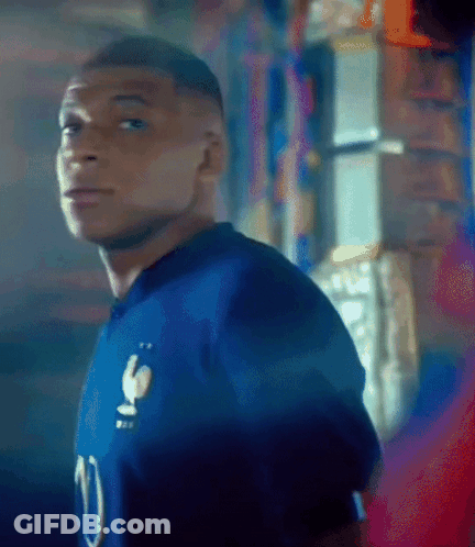 A Man In A Blue Jersey With The Number 10 On It GIF
