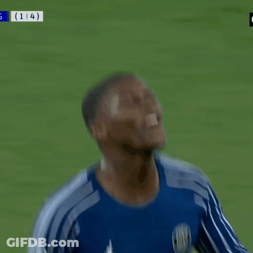 A Man In A Blue Jersey With The Number 14 On The Back GIF