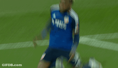 A Man In A Blue Mercy Health Jersey Is Running On A Field GIF