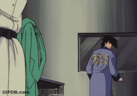 Man In Blue Robe With Chinese Symbol GIF