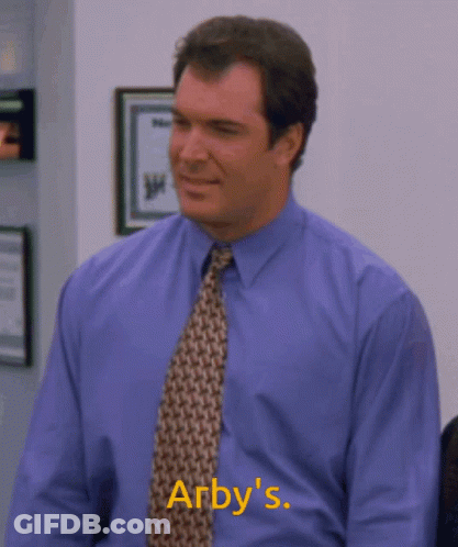 A Man In A Blue Shirt And Tie Says Arby 'S In Yellow GIF