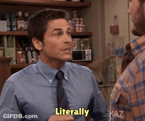 A Man In A Blue Shirt And Tie Says Literally In A Kitchen GIF