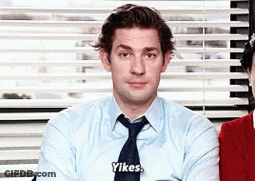 A Man In A Blue Shirt And Tie Says Yikes . GIF