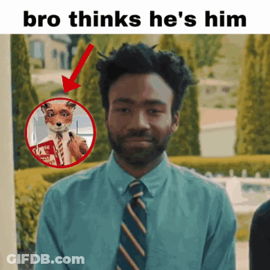 Man In Blue Shirt And Tie With Fox Face GIF