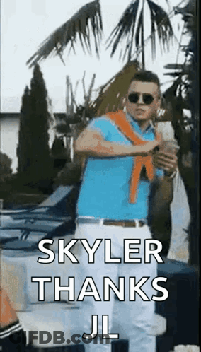 A Man In A Blue Shirt And White Pants Is Standing In Front Of A Palm Tree Holding A Cup Of Coffee . GIF
