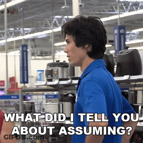 A Man In A Blue Shirt Asks What Did I Tell You About Assuming In A Store GIF