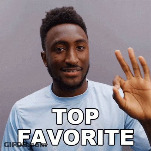 A Man In A Blue Shirt Giving An Ok Sign With The Words Top Favorite Behind Him GIF