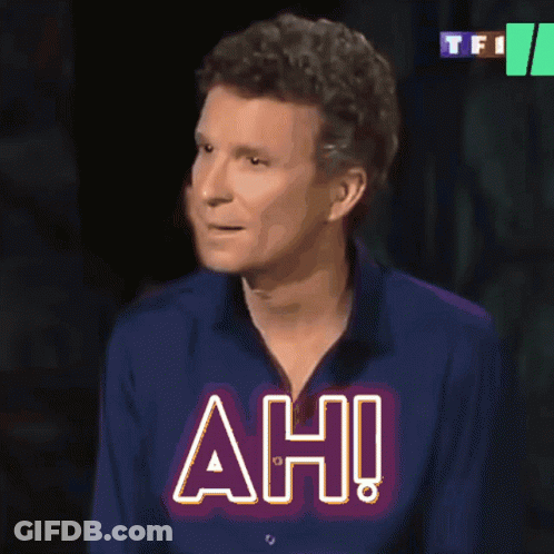 Man In Blue Shirt With Ah On Chest GIF