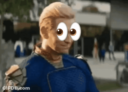 A Man In A Blue Shirt Has Cartoon Eyes GIF