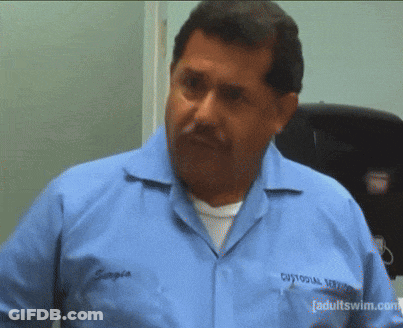 A Man In A Blue Shirt Has The Words I No Clean On His Shirt GIF