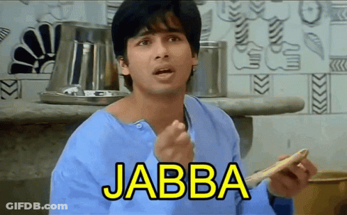 A Man In A Blue Shirt Is Holding A Piece Of Bread With The Word Jabba Written On It GIF