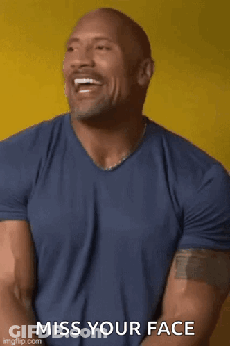 A Man In A Blue Shirt Is Laughing And Saying Hey Girl !!! GIF