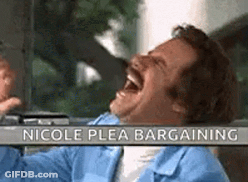 A Man In A Blue Shirt Is Laughing In A Car With The Words `` Nicole Plea Bargaining '' Behind Him . GIF