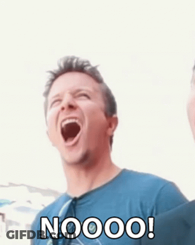 A Man In A Blue Shirt Is Laughing With The Words Noooo Written On His Face GIF