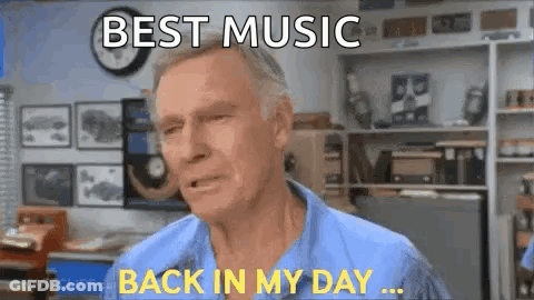 A Man In A Blue Shirt Is Making A Funny Face And Says `` Best Music Back In My Day ... '' GIF