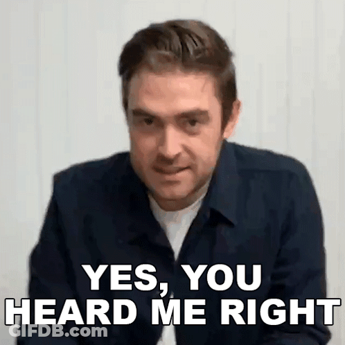 A Man In A Blue Shirt Is Making A Funny Face And Says `` Yes , You Heard Me Right '' . GIF