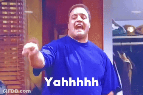 A Man In A Blue Shirt Is Pointing At The Camera And The Word Yahhhh Is On The Bottom GIF
