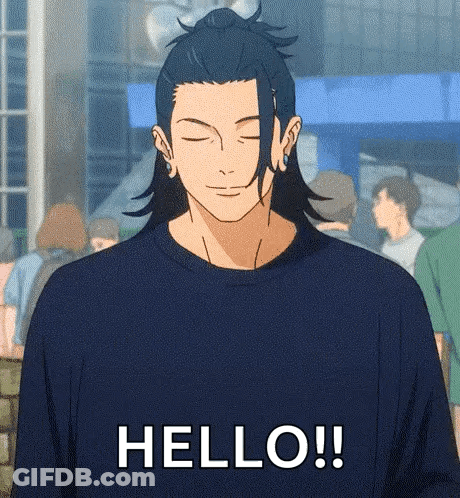 A Man In A Blue Shirt Is Standing In Front Of A Crowd And Saying `` Hello '' . GIF
