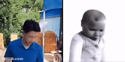 Man In Blue Shirt Next To Baby With Hole In Head GIF