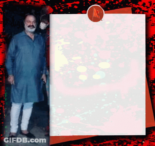 A Man In A Blue Shirt Is Standing Next To A Piece Of Paper With A Red Circle On It GIF