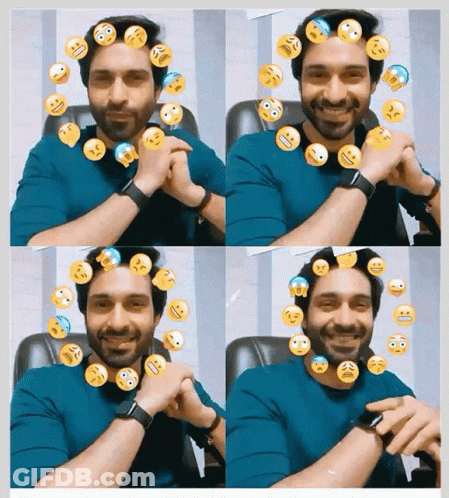 A Man In A Blue Shirt Is Surrounded By Smiley Faces On His Head GIF