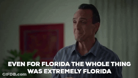 A Man In A Blue Shirt Is Talking About Florida And Crying . GIF
