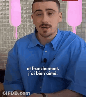 Man In Blue Shirt Speaking French GIF