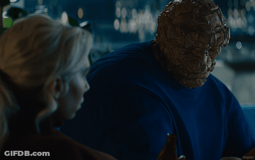 A Man In A Blue Shirt Is Talking To A Woman With The Caption Kepler GIF