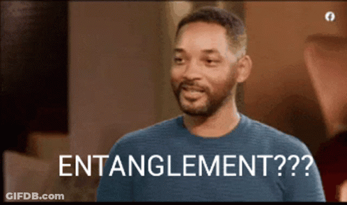 A Man In A Blue Shirt Says " Entanglement ?? " GIF