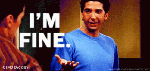 A Man In A Blue Shirt Says " I 'M Fine " In White Letters GIF