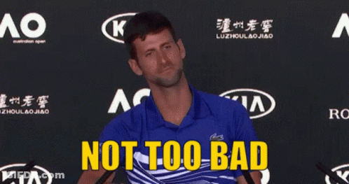 A Man In A Blue Shirt Says Not Too Bad In Front Of A Kia Logo GIF