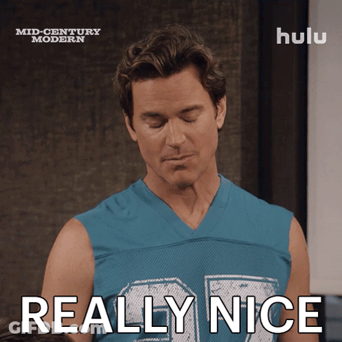 A Man In A Blue Shirt Says Really Nice In Front Of A Hulu Logo GIF