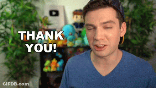 A Man In A Blue Shirt Says Thank You With His Eyes Closed GIF