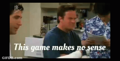A Man In A Blue Shirt Says This Game Makes No Sense While Sitting In A Room With Other People . GIF