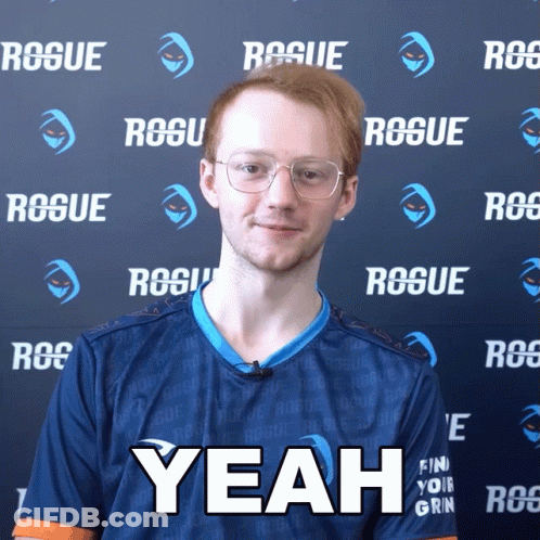 A Man In A Blue Shirt Says Yeah In Front Of A Rogue Wall GIF